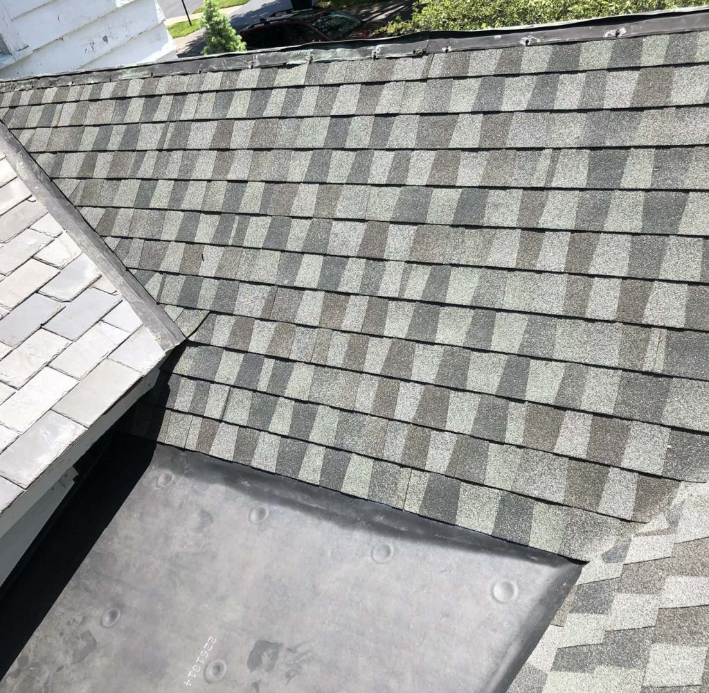 Licensed Roofing Company Pinnacle Roofing Partners repairing commercial roof