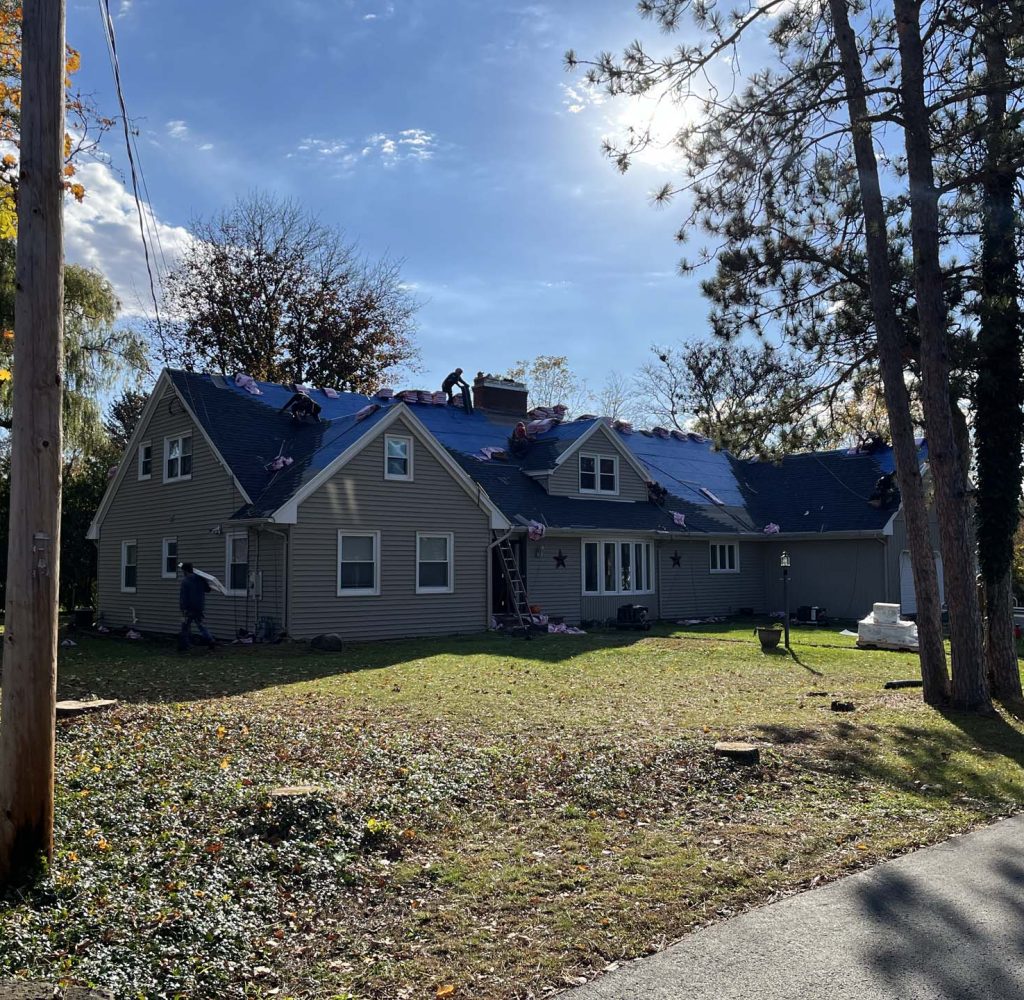 Pinnacle Roofing Partners team performing residential roof replacement