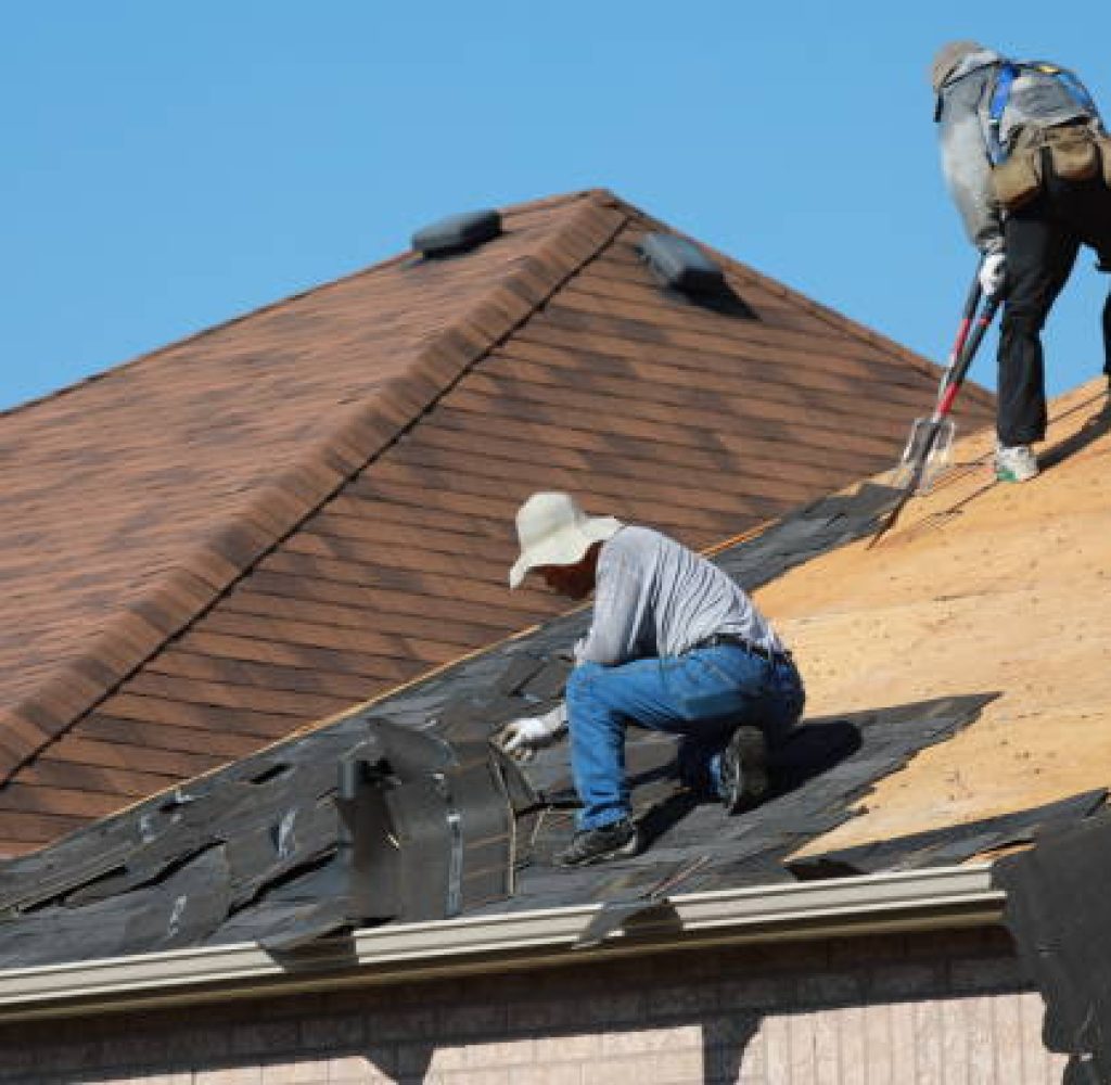 Pinnacle Roofing Partners expert performing roof repair on Austin Texas home