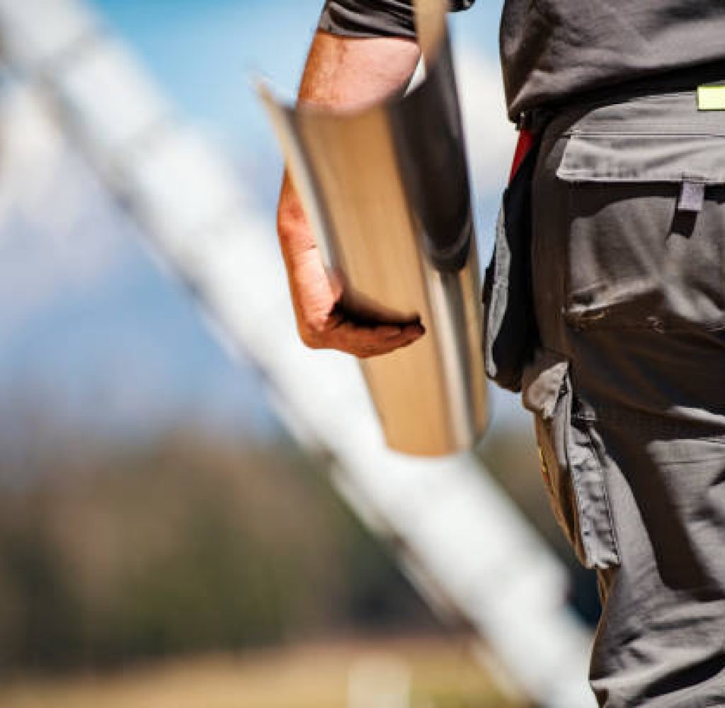 Roofing company preparing home for full roof replacement