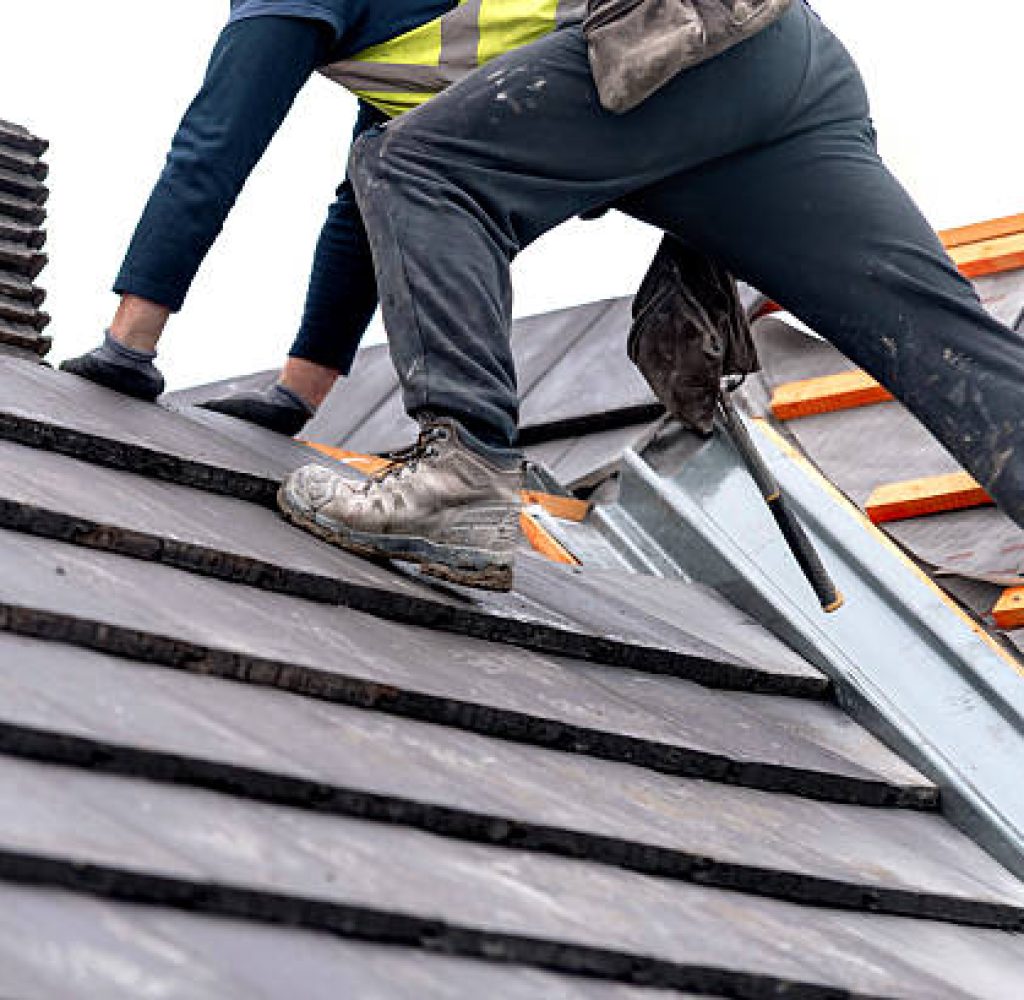 Pinnacle Roofing Partners removing old roofing material safely